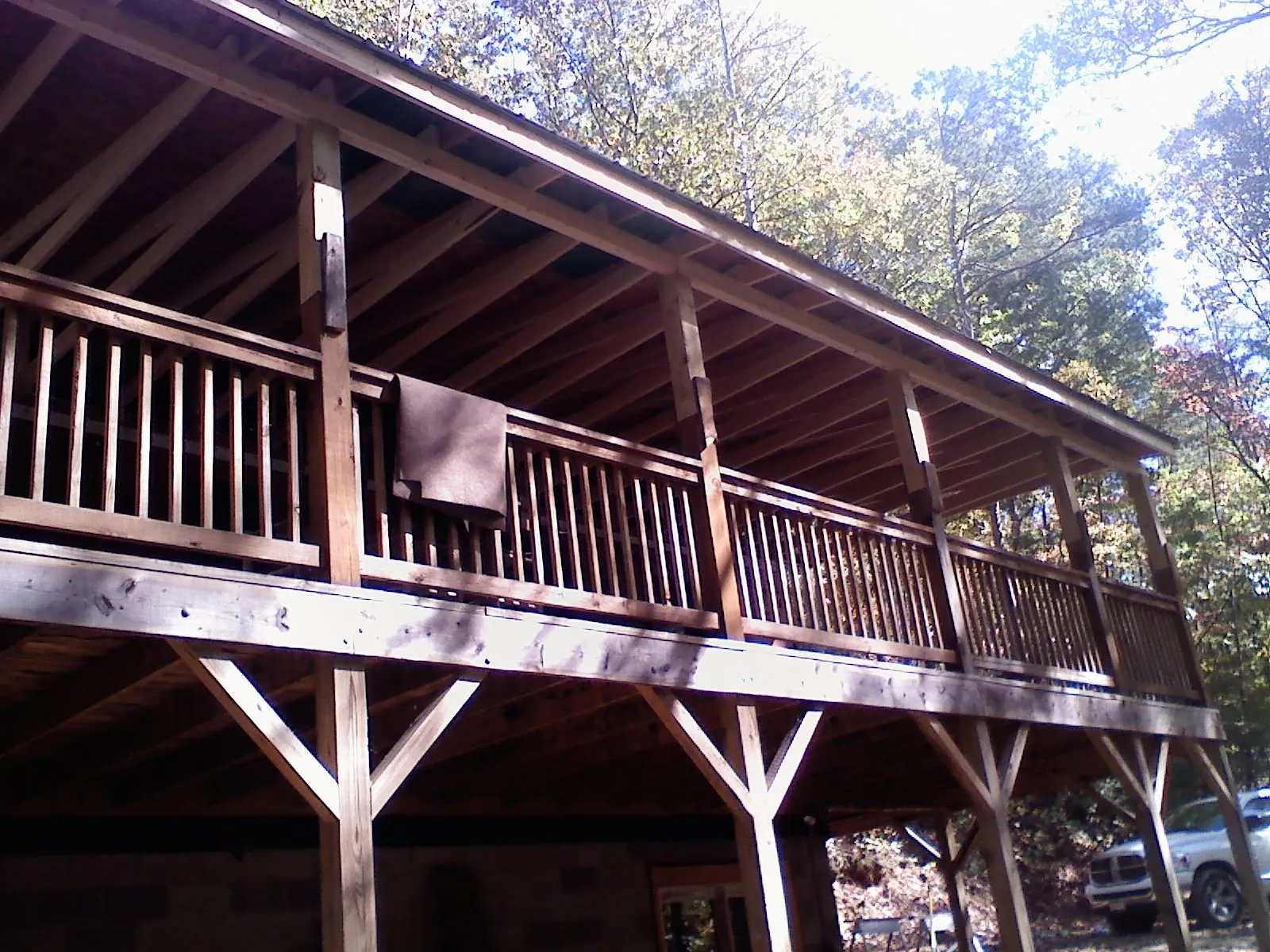 Timber framing under a new elevated porch and deck — Roof Leak Repair in Mahopac by Roofing Brothers